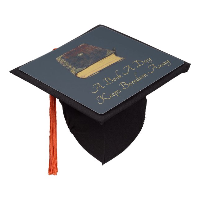A Book A Day Keeps Boredom Away Graduation Cap Topper (Angled)