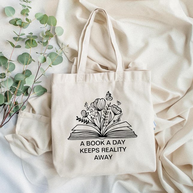 A Book a Day Keeps Reality Away Funny Design Tote Bag (Carry your love for reading with our tote bag featuring a witty book quote—perfect for book lovers!)
