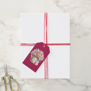 A bouquet of flowers in a watering can for mom  gift tags