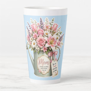 A bouquet of flowers in a watering can for mom latte mug