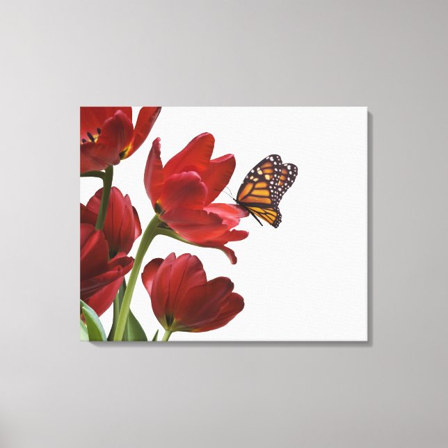 a bouquet of red tulips is visited by a monarch canvas print (Front)