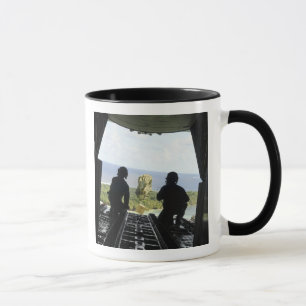 A box of humanitarian goods mug
