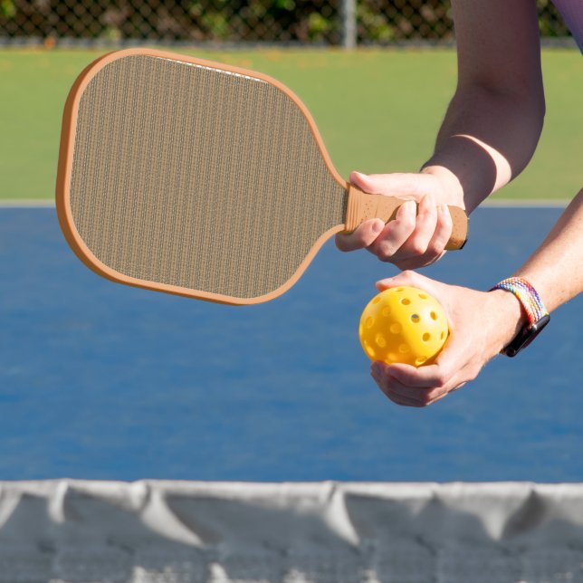 a brown and beige striped background pickleball paddle (Insitu)