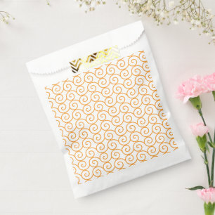 A brown and orange rug with a repeating pattern mo favour bag