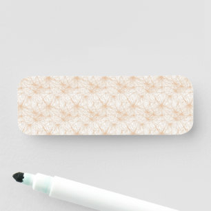 a brown background with a pattern of circles name tag