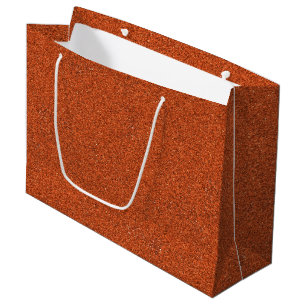A brown paper shopping bag with a white handle