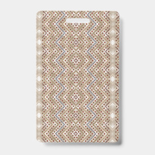 A brown rug displaying a symmetrical design featur badge