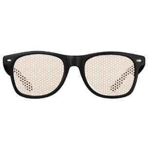 A brown rug with an intricate motif lies on the fl retro sunglasses
