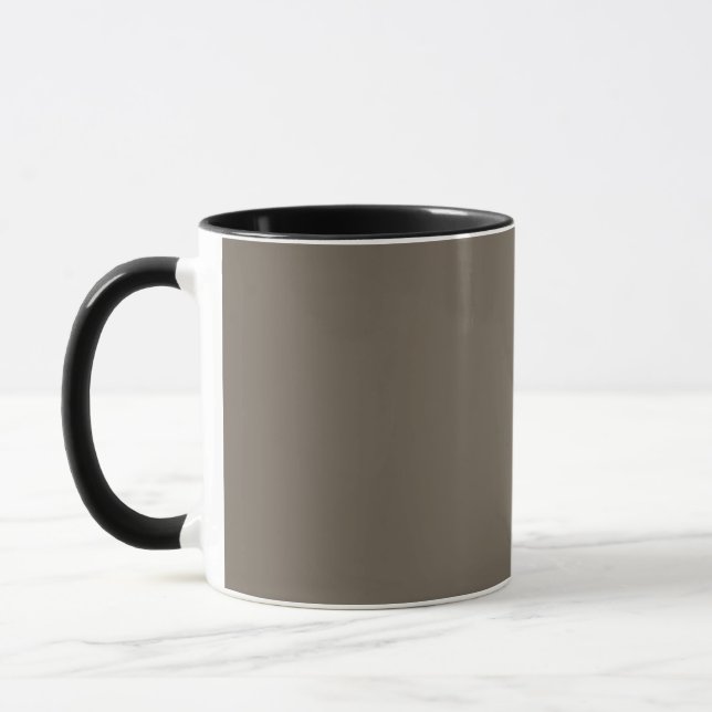 a brown wall with a black and white clock on it mug (Left)