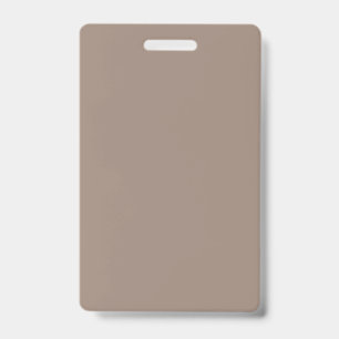 a brown wall with a clock on it badge
