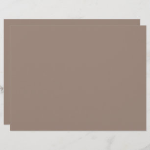 a brown wall with a clock on it letterhead