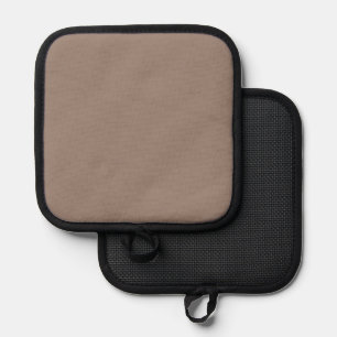 a brown wall with a clock on it pot holder