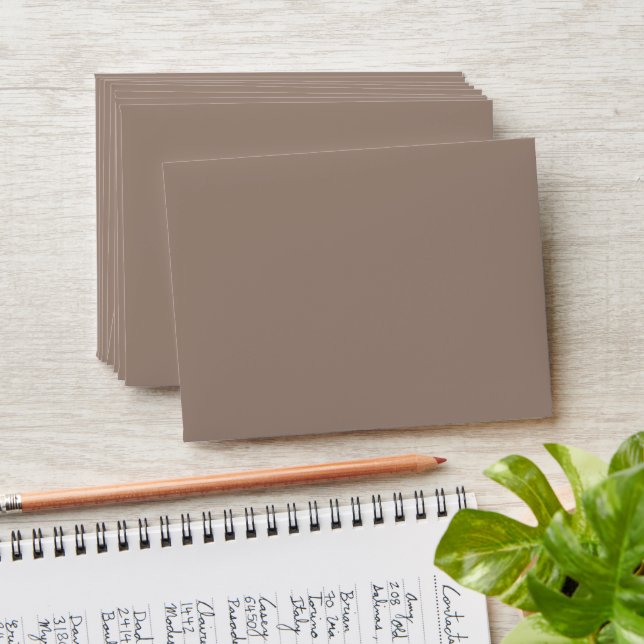 a brown wall with a envelope (Stacked)