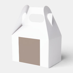 a brown wall with a favor box