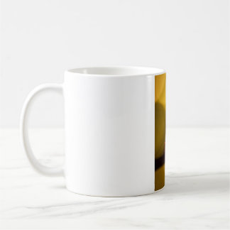 A burning candle coffee mug