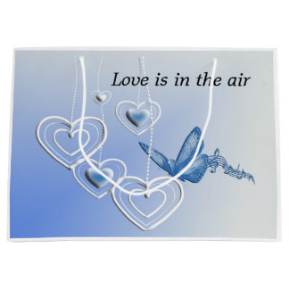 A butterfly and hearts large gift bag