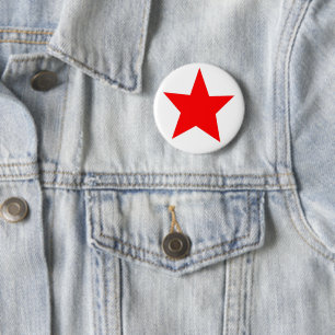 A Button With A Red Star Badge