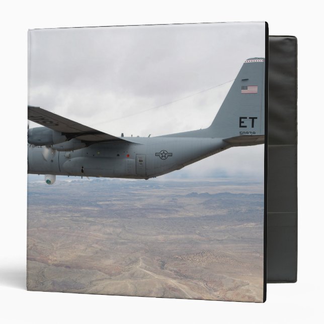 A C-130 Hercules soars through the sky Binder (Front/Inside)