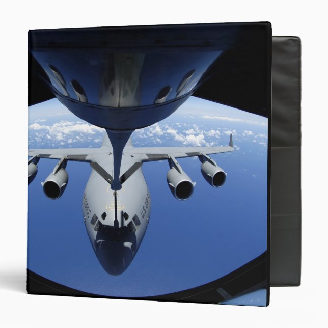 A C-17 Globemaster III receives fuel Binder (Front/Inside)