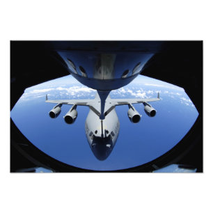 A C-17 Globemaster III receives fuel Photo Print