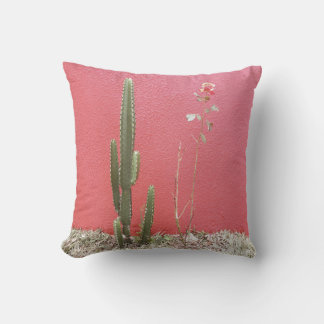 A cactus and a rose throw pillow