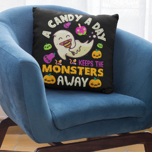 A Candy A Day Keeps The Monsters Away Halloween Throw Pillow
