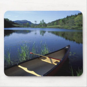 A canoe rests on the shore of Little Long Pond Mouse Pad