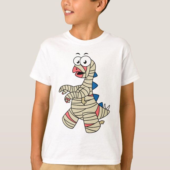 A Cartoon Stegosaurus Dressed Up As A Mummy. T-Shirt (Front)