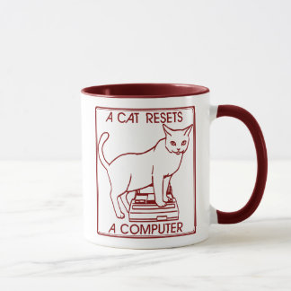 A cat resets a computer in Japan Mug