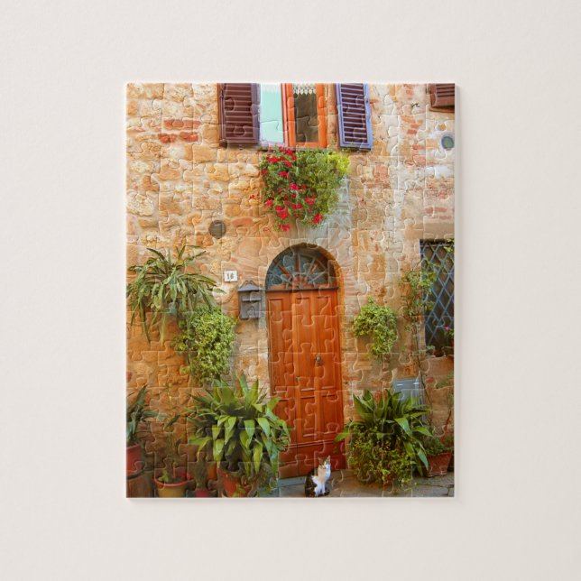 A cat seeks entrance to home in Pienza, Italy. Jigsaw Puzzle (Vertical)
