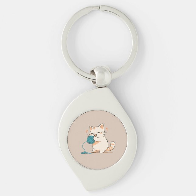 A cat spinning yarn is so cute keychain (Front)