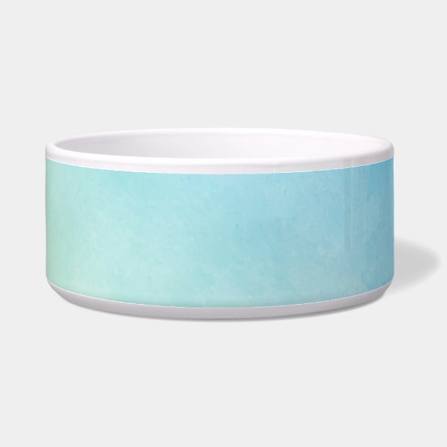 A ceramic bowl with a light blue marbled texture  (Left)