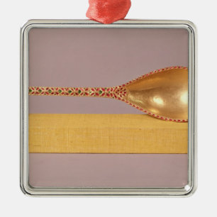 A ceremonial spoon metal ornament