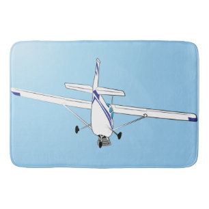 A Cessna in flight Bath Mat