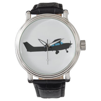 A Cessna in silhouette Watch