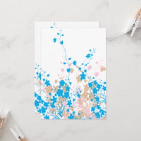 A charming arrangement of blue and pink flowers se