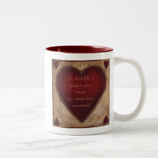 A Child Fills Mug
