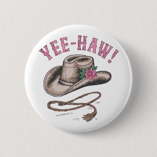A classic cowboy hat  adorned with a single pink  2 inch round button