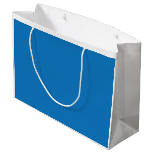 A clear blue sky with no clouds fills the entire f large gift bag