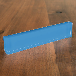 A clear blue sky with no clouds fills the entire f nameplate