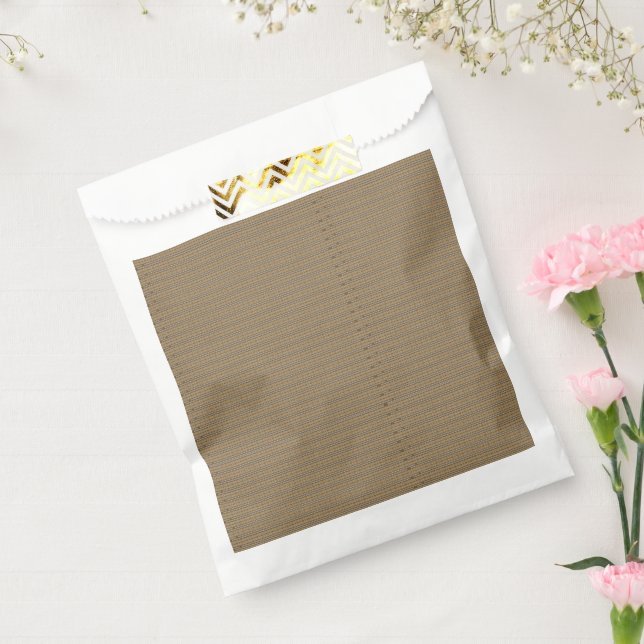 A close-up image showcasing a fabric with a tan an favour bag (Sealed)