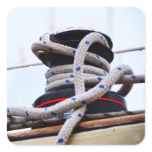 A close-up of a sailboat winch on a boat.