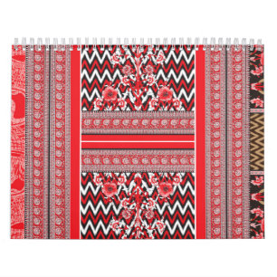 A close-up of red and black patterned fabric showc calendar