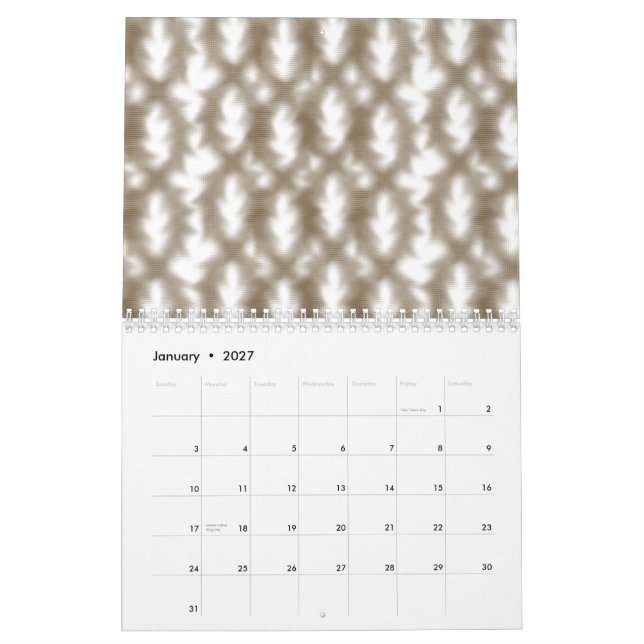 A close-up view of a crisscrossing wire mesh grid  calendar (Jan 2027)