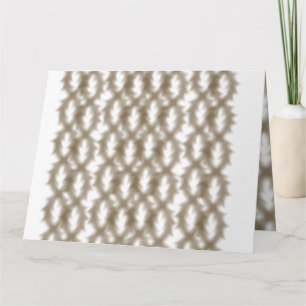 A close-up view of a crisscrossing wire mesh grid  card