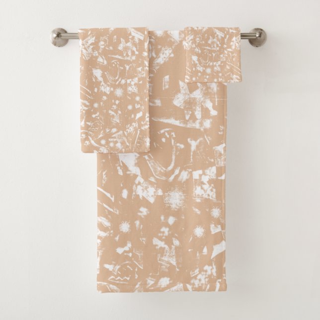 A close-up view of a textured wall featuring patte bath towel set (Insitu)