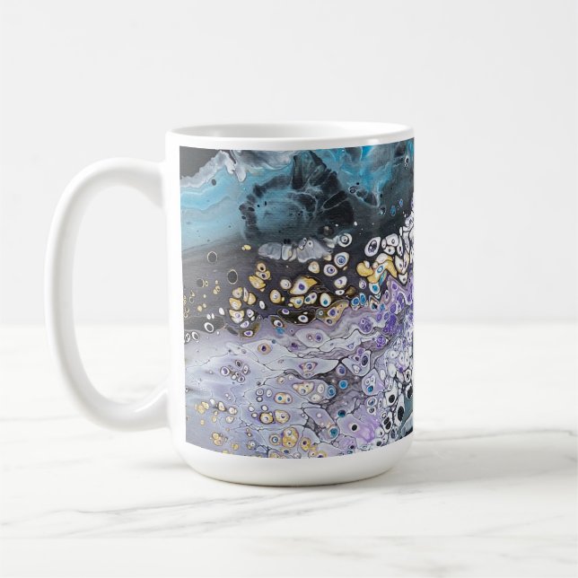 A coffee mug with black and blue original artwork  (Left)