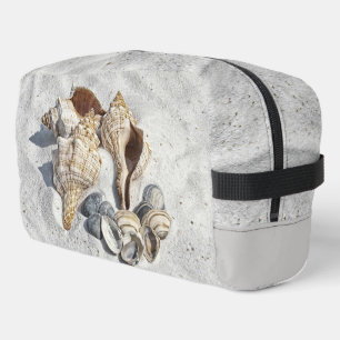 A Collection of Seashells on Sand Dopp Kit