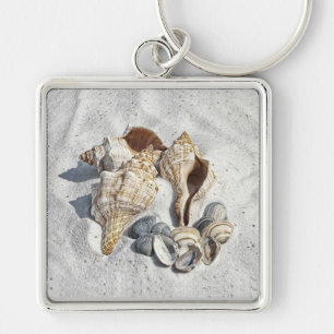 A Collection of Seashells on Sand Keychain