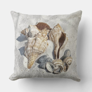 A Collection of Seashells on Sand Throw Pillow